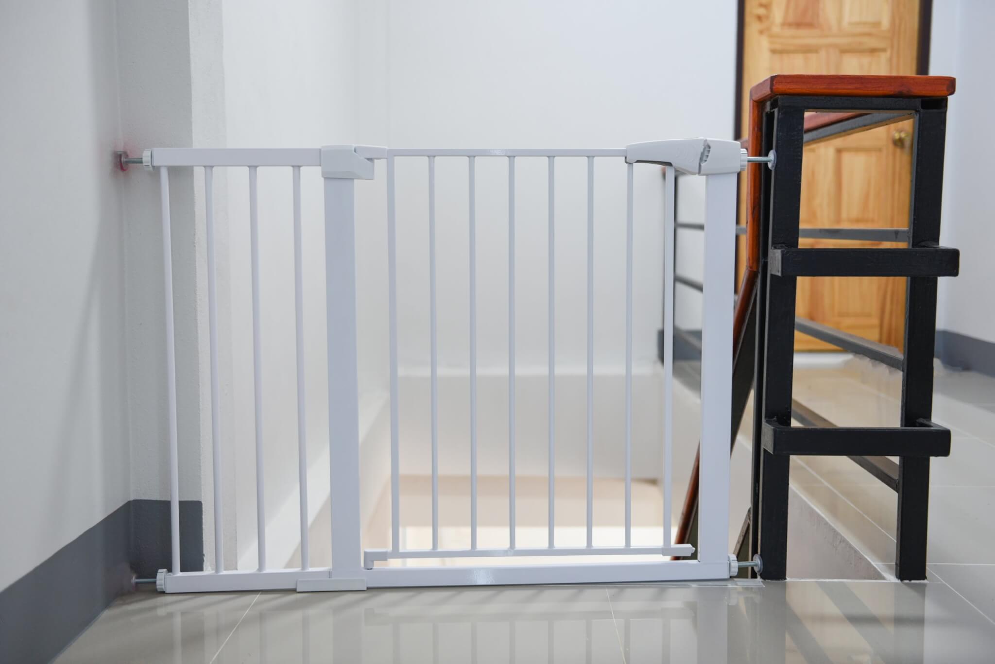 Protect small vacation rental guests by installing gates at the top of staircases