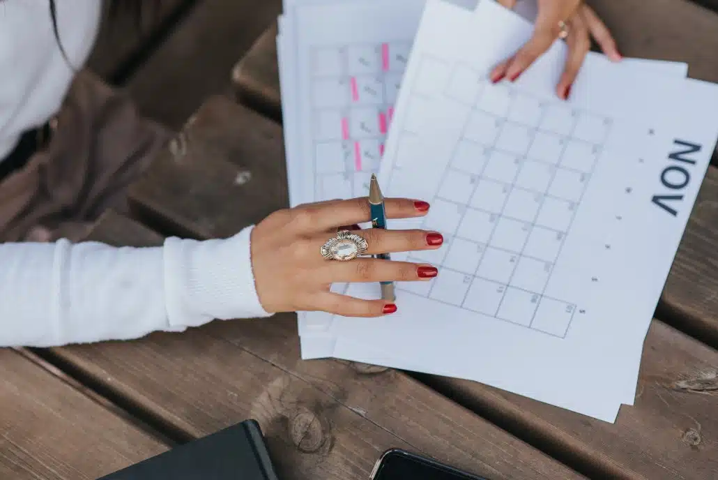 Woman working on a calendar