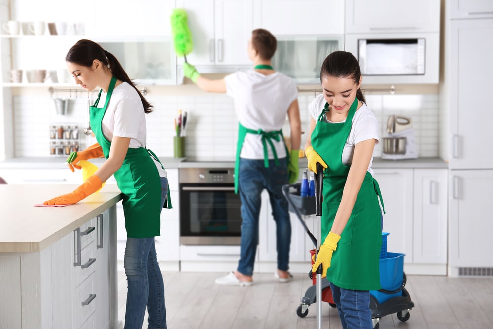 Team cleaning a kitchen