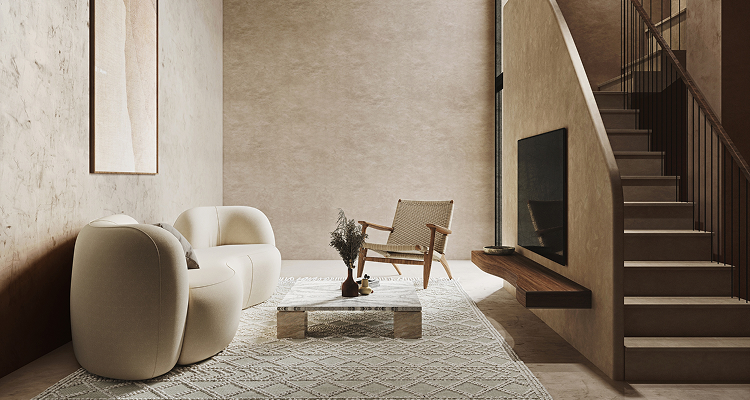 Minimalist living room with a curved cream sofa, stone coffee table, and wooden staircase.